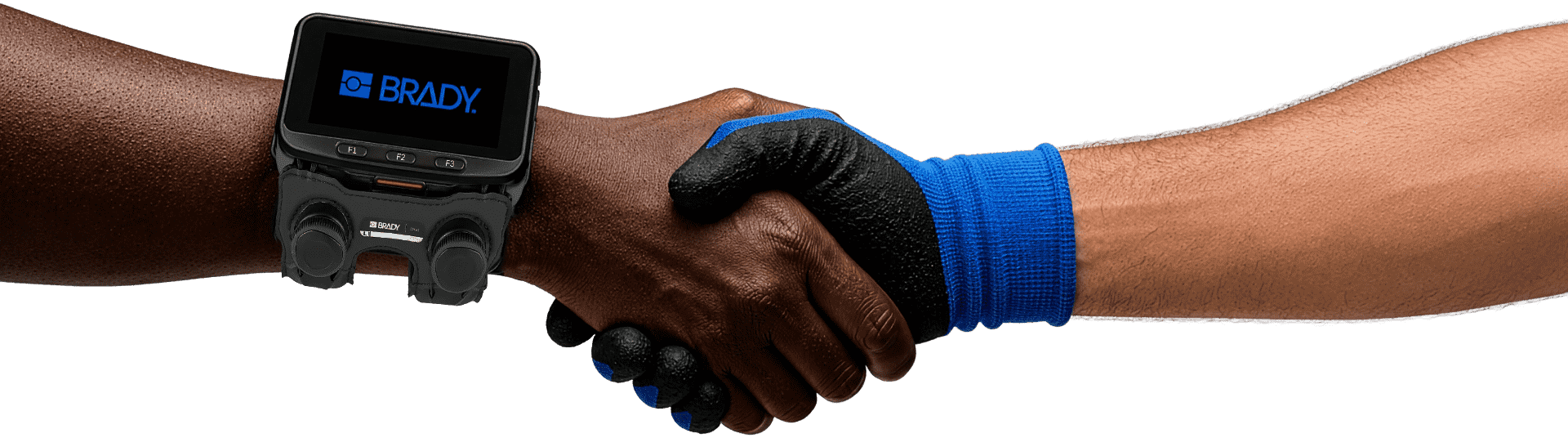 A close-up of a handshake. One person wears a mobile computer on his wrist, and the other person wears a work glove.