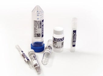 A collection of vials and lab testing supplies.