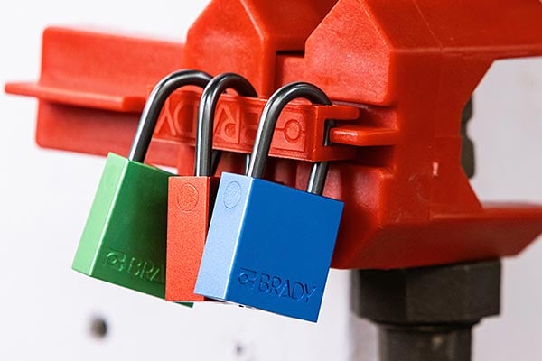 Three locks on a tagout device.