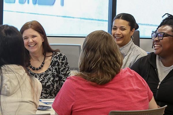 Brady employees in a conference room