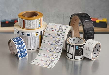 brady custom labels on a work table