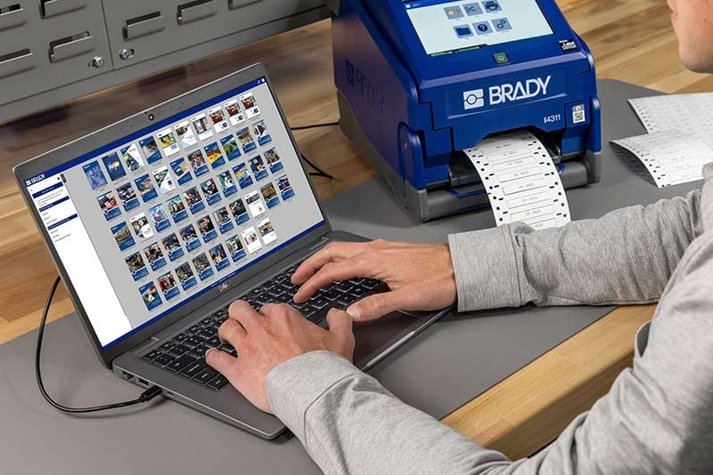 Person using the brady digital catalog on their laptop