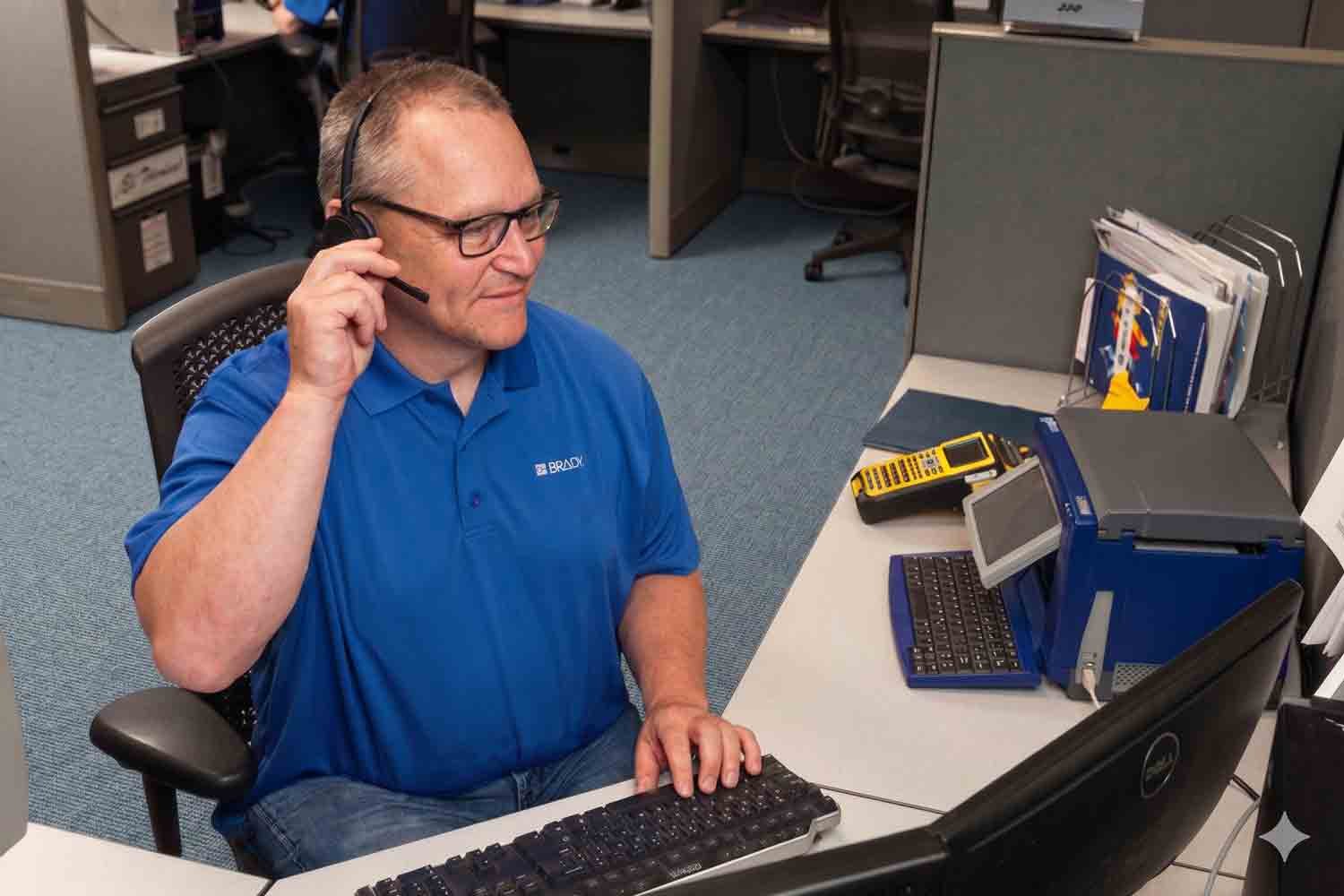 Brady support worker taking a customer call