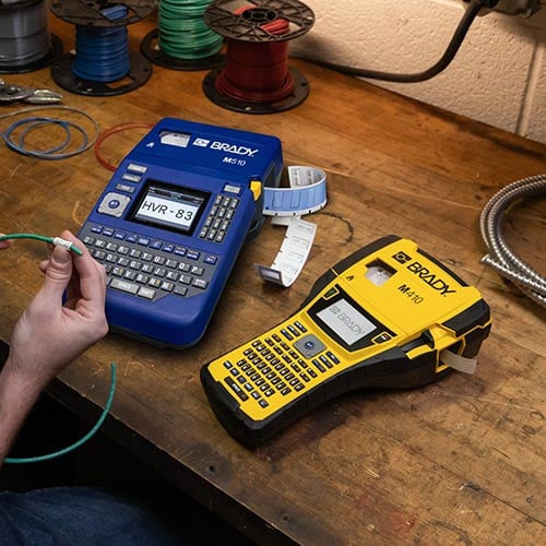 Brady M410 and M510 printers on a table