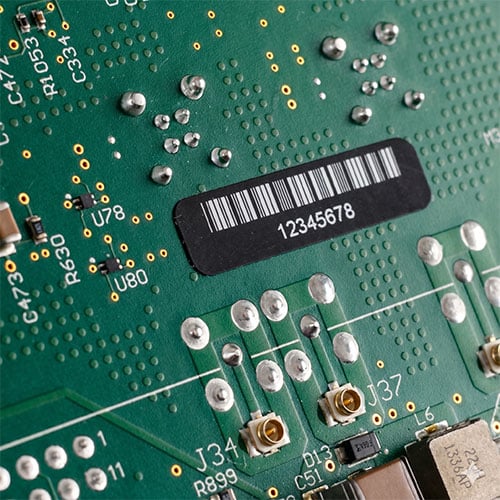 A laser marked label on a circuit board