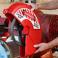 Brady gate valve lockout being attached to a valve.