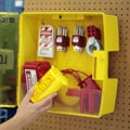 Brady lockout tagout station with tags, cables, and padlocks.