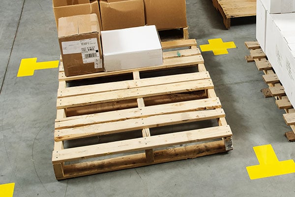 A wooden pallet with stacked boxes
