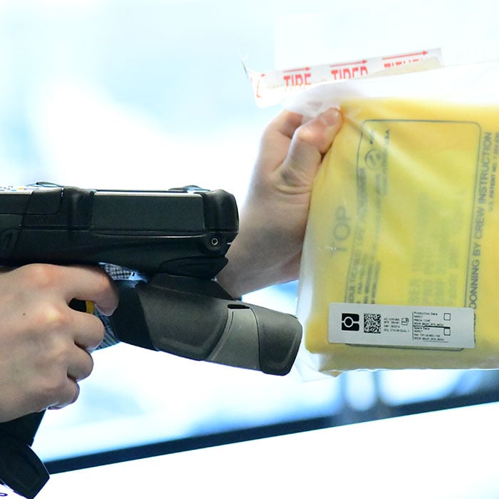 Person scanning a brady RFID label