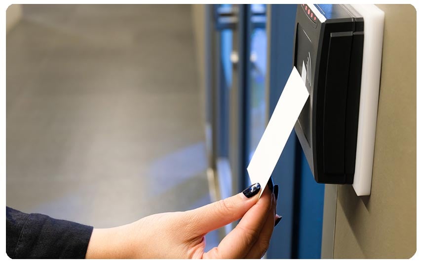 A person using an RFID card reader.