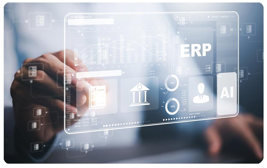 Worker in front of a virtual enterprise resource planning (ERP) system.