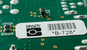 Brady label on a green circuit board. 