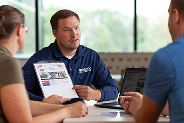 A Brady employee giving a sales presentation.