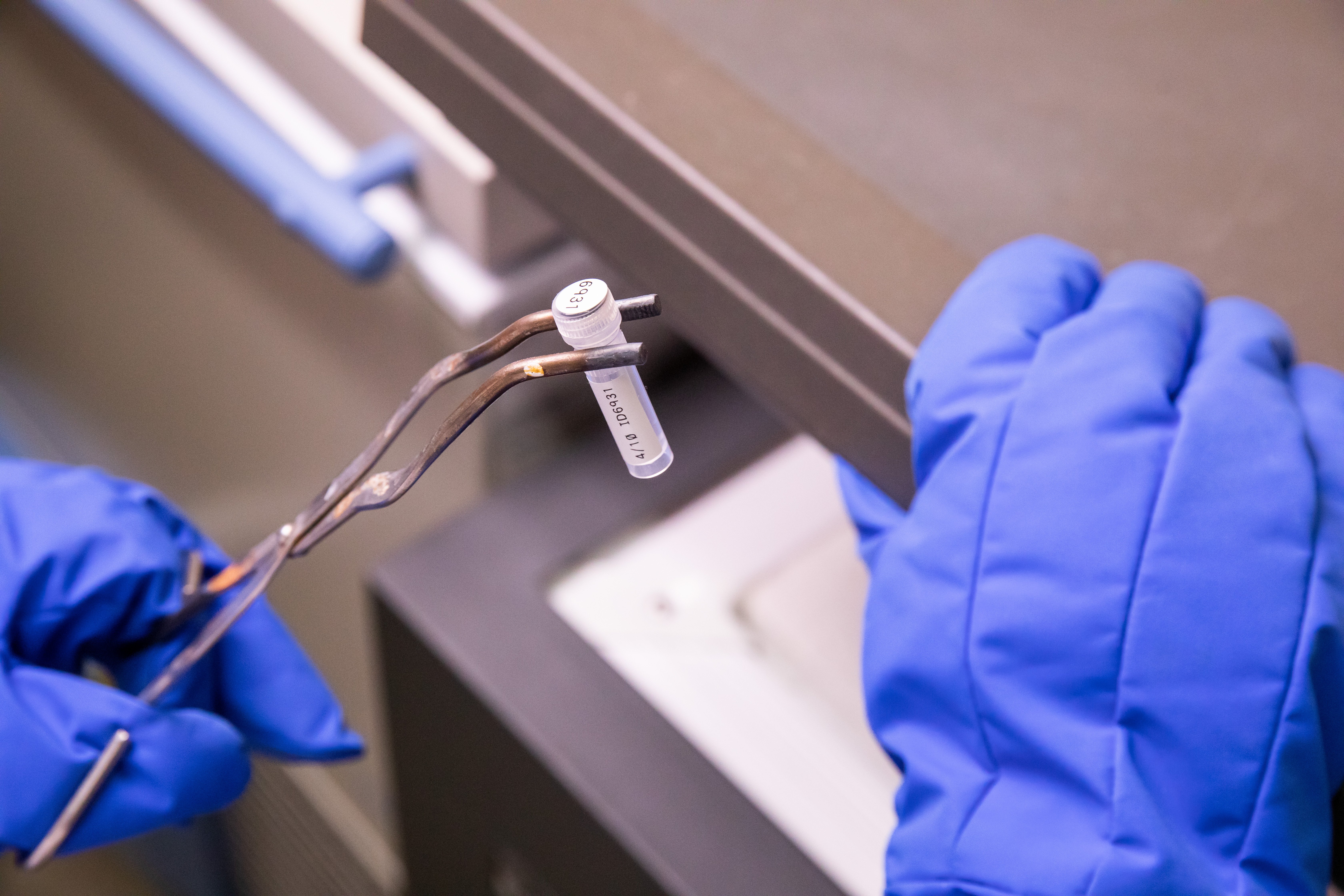 Close-up of a cryogenic vial labeled with a Brady Freezerbondz label.