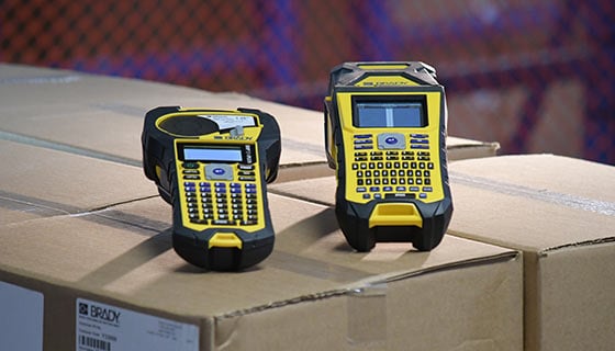 Two Brady handheld label printers.