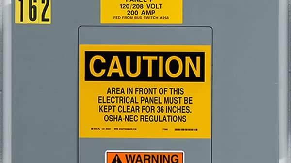 An electrical box with a variety of safety labels.