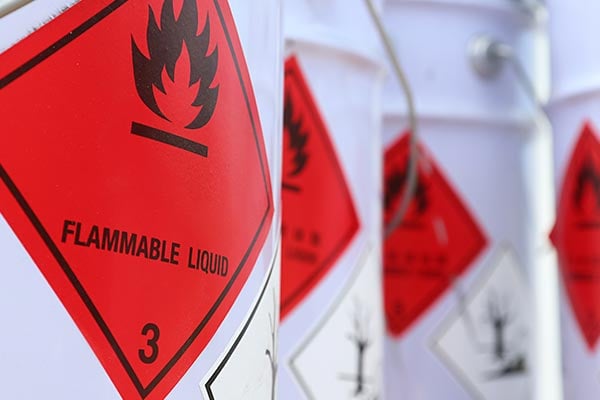 A closeup of red hazard warning labels.