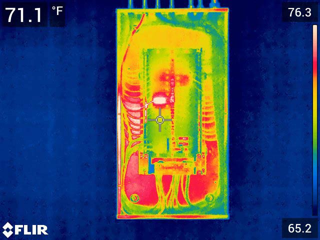 Hot spots on an electrical panel seen through an infrared camera Thermal image of an electrical panel showing hot spots on connections
