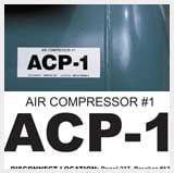 Two labels reading air compressor number one. 