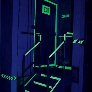Industrial door and railings with glow in the dark labeling. 
