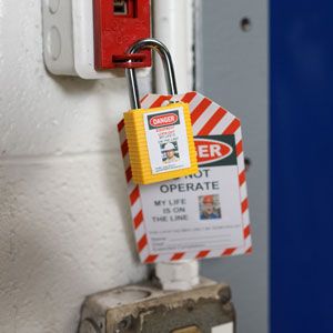 Labels on Brady lockout tags and safety padlock.