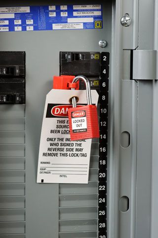 Closeup image of a Brady LOTO tag and padlock.