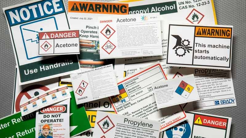 A collection of various printed warning labels. 