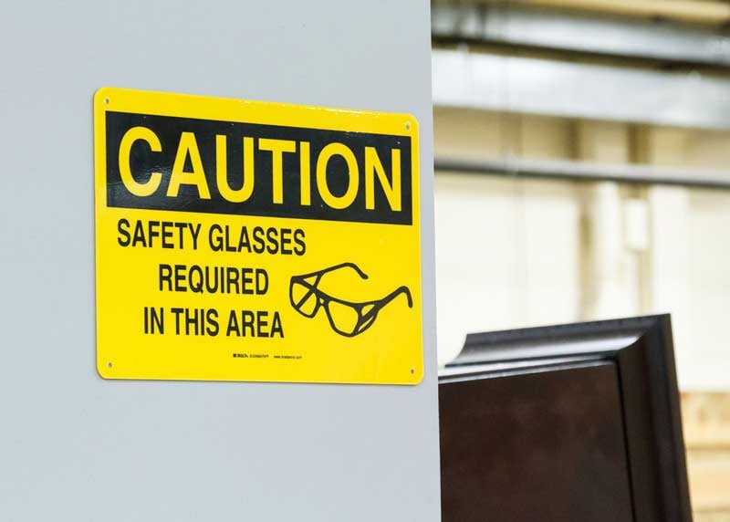 Safety glasses caution sign.