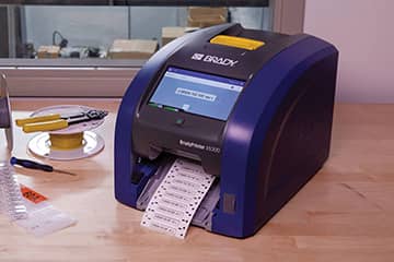 Closeup of a Brady label printer model i5300.