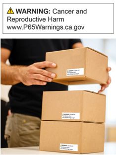 Boxes stacked with warning labels.