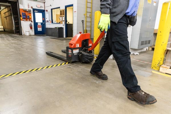 Pallet being pulled through a facility.