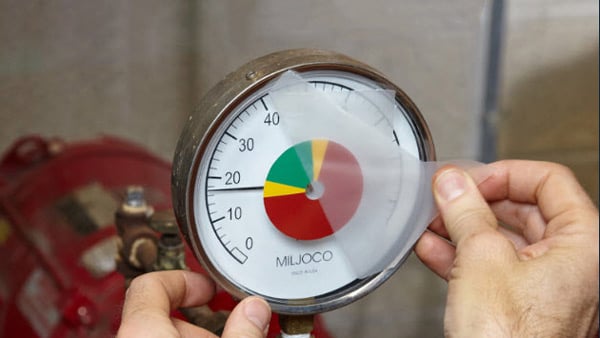 A label with colored segments applied to a dial.