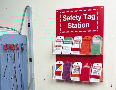 Closeup of a red safety tag station. 