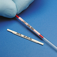 A small straw with a wrap around label.