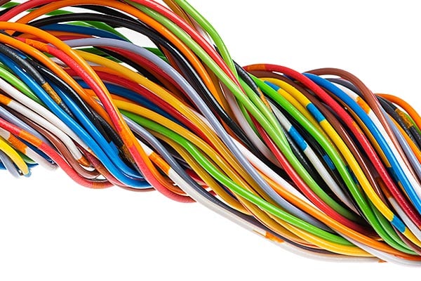 Many colorful wires twisted together into one group.