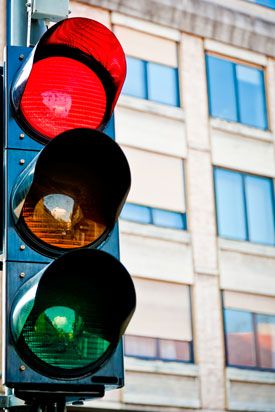 Closeup of a traffic stoplight on red. 