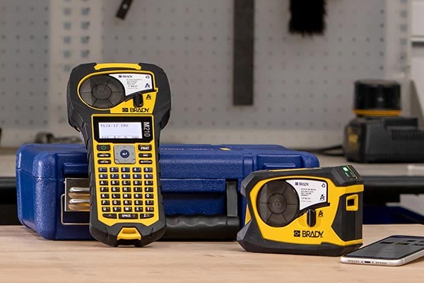 Closeup of a Brady 201 and a Brady 211 label printer.