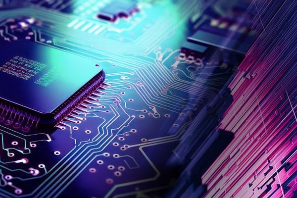 A purple and blue glossy image of a printed circuit board (PCB).