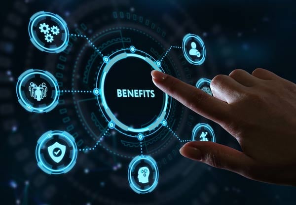 Hand touching a screen with the word benefits on it.