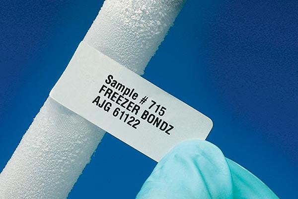 Cryogenically frozen tube with Brady FreezerBondz&#x2122; Cryogenic polyester label on it.