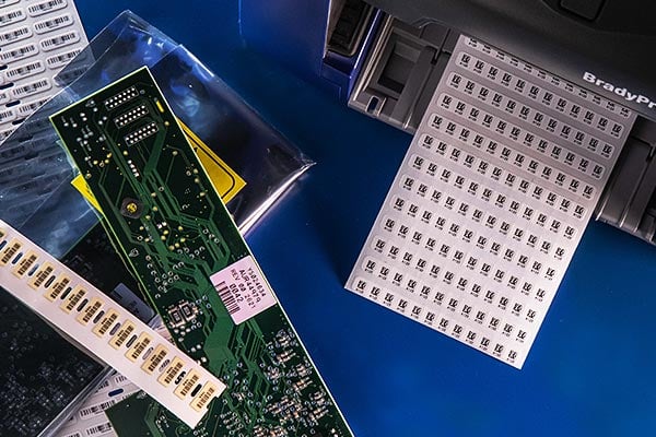 Closeup of a Brady i5300 industrial label printer and supplies.