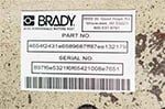 A barcode identification and asset tag label.