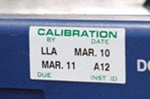 An inventory label on the side of a parts tray.