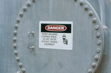 A danger sign in a industrial equipment.