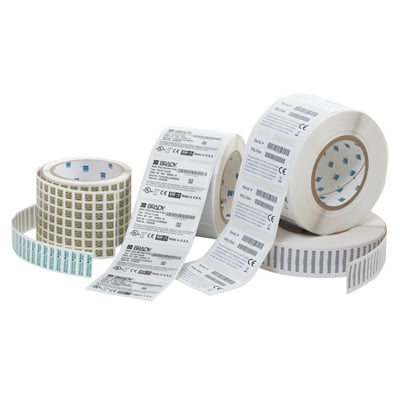 A collection of different rolls of barcode labels.