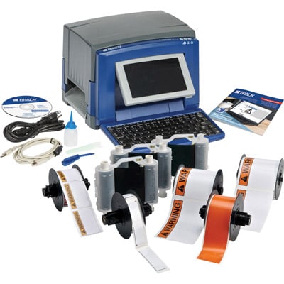 A BradyPrinter S3100, printer cables, ribbon cartridges, arc flash and  solid orange printer label supplies.