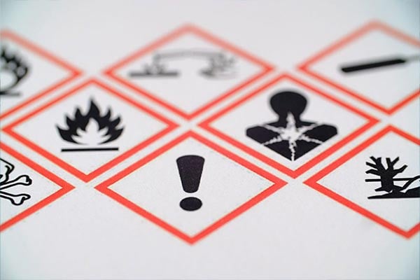 A variety of GHS pictograms.