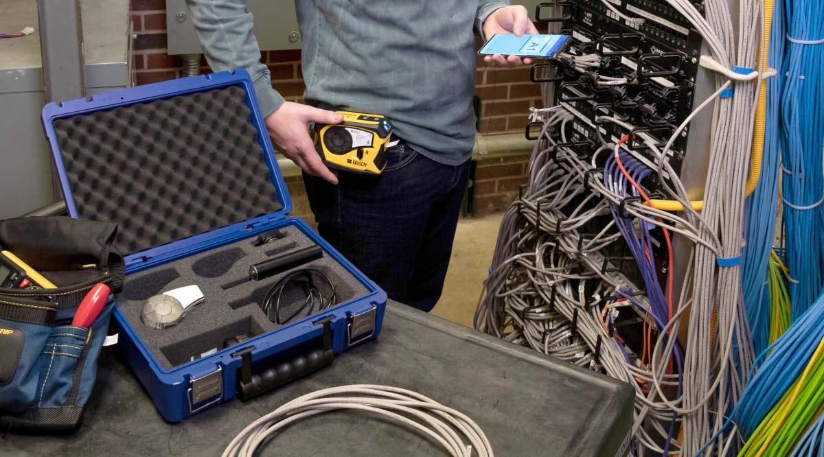 M211 printer being held