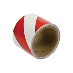a roll of red and white tape